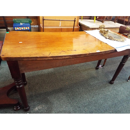 647 - A Victorian bow-front communion table resting on turned supports