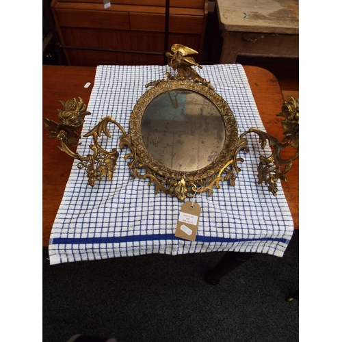 648 - An ormolu French girandole wall mirror with an original plate