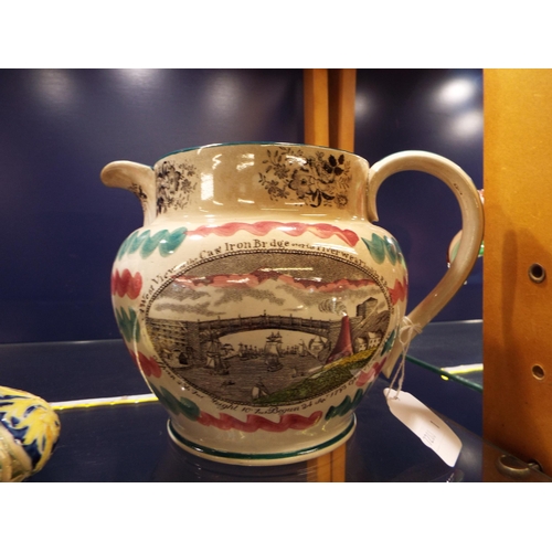 24 - A Sunderland glazed jug commemorating the new bridge, a view of the cast iron bridge and reverse vie... 