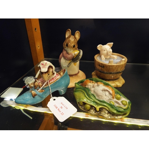 36 - Four Beswick Beatrix Potter figurines to include 'Hunca Munca', 'The Old Woman Who Lived in a Shoe',... 