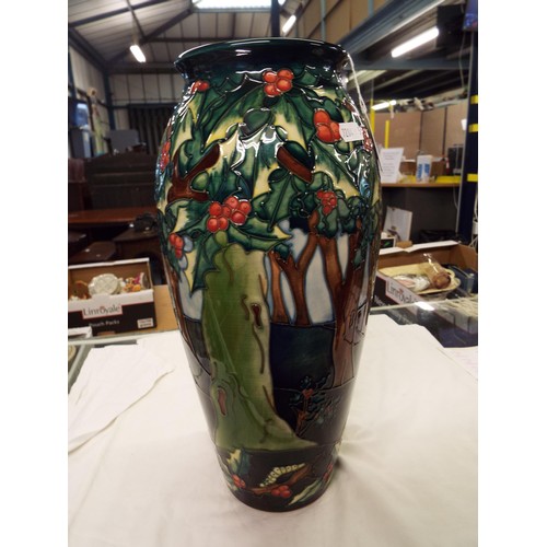 16 - A Moorcroft Holly Hatch pattern vase by Philip Gibson, signed to base 14