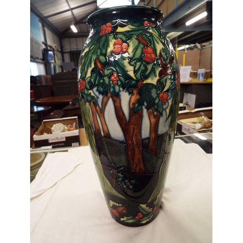 16 - A Moorcroft Holly Hatch pattern vase by Philip Gibson, signed to base 14