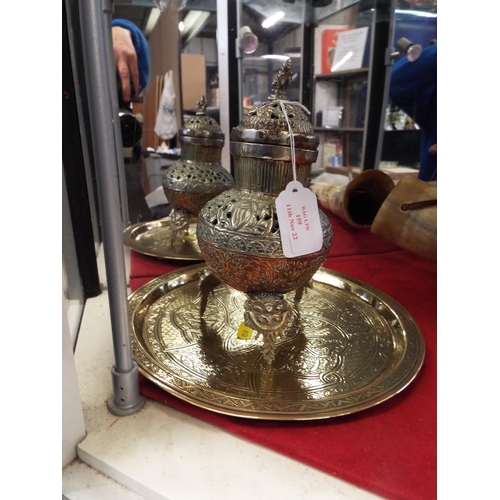 159 - A round brass Islamic tray together with an Islamic silver and copper potpourri vase and cover