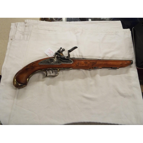 167 - A replica Flintlock pistol