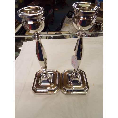 192 - A pair of 1936 London silver candlesticks, 10