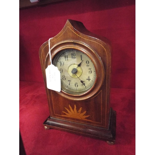 270 - A mahogany inlaid mantel clock the dial having Arabic numerals