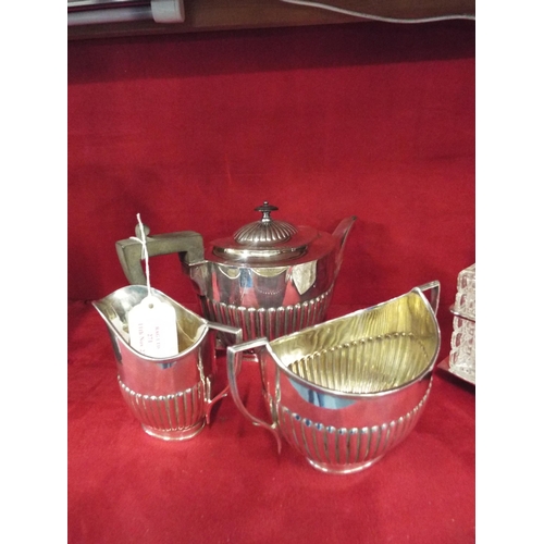 271 - A Walker Hall three piece silver-plated tea set