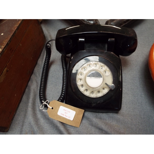 317 - A vintage black plastic telephone