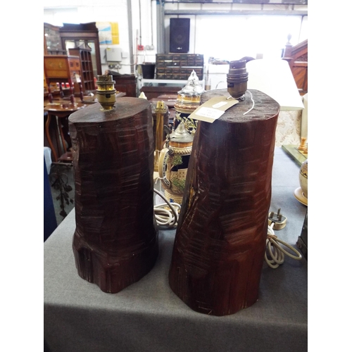 332 - A pair of heavy carved tree trunk lamps