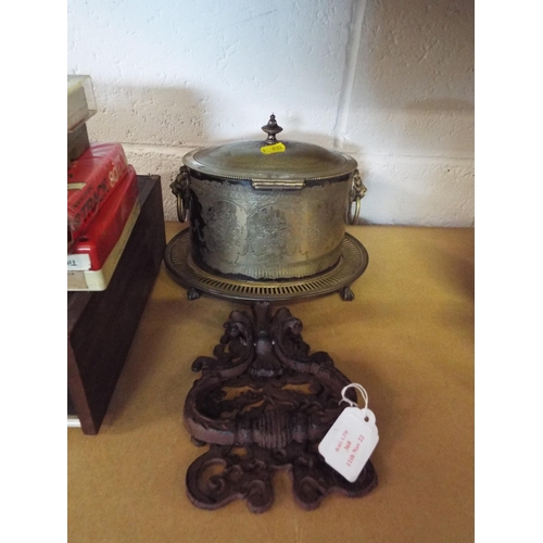 368 - An iron ornate door knocker together with a Victorian plated biscuit barrel