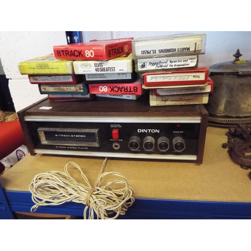 369 - A vintage eight track player and twelve cassettes