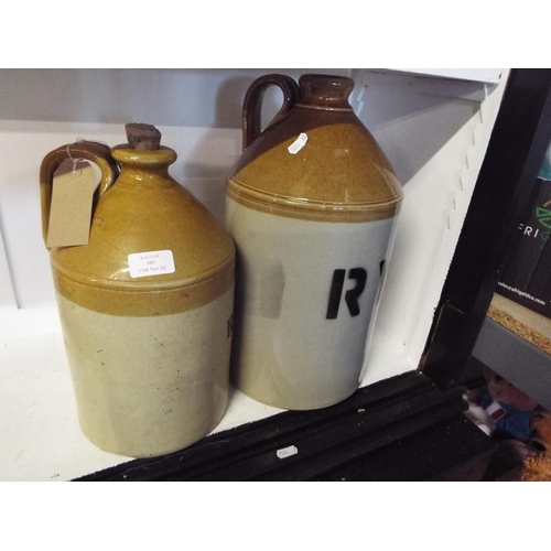 389 - Two vintage stone ware flagons with Rye mark