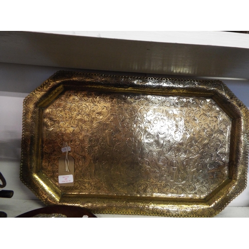 408 - An Indian brass tray having engraved figurines and animals