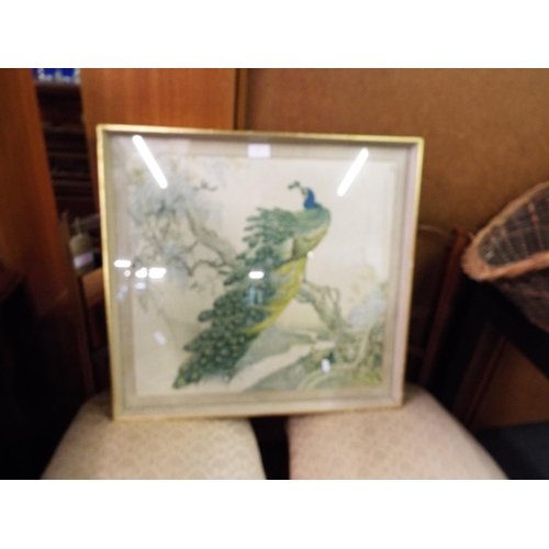 433 - An Oriental print of a Peacock, signed