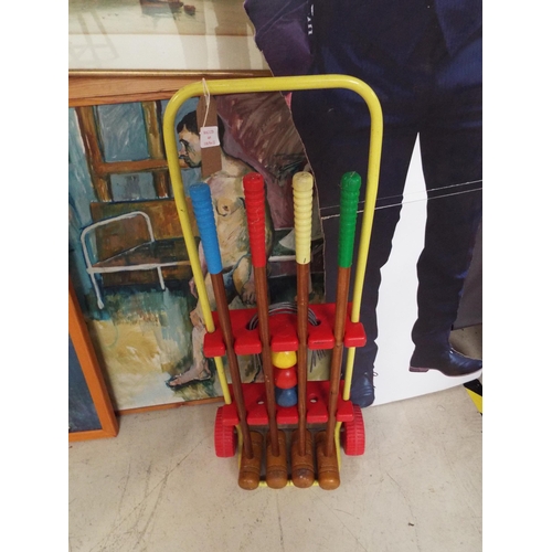 469 - A vintage child's croquet set