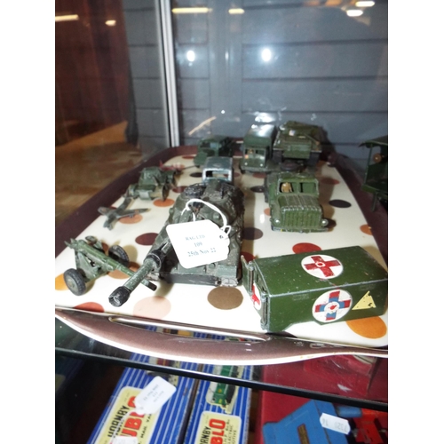 109 - A selection of vintage Dinky military vehicles to include tank transporter and tank