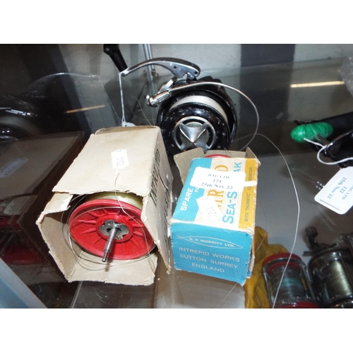 121 - A Morritt Intrepid Surfcast fishing reel together with a spare spool etc