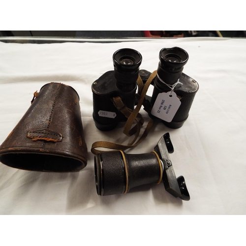 128 - A pair of vintage binoculars along with an antique monocular in leather case