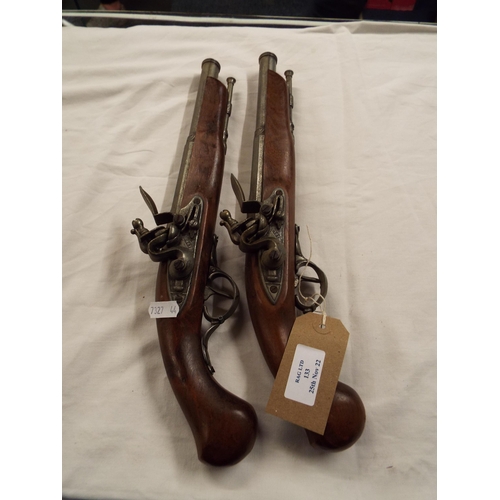 133 - A pair of replica percussion pistols