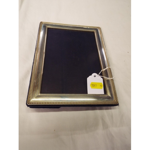 188 - A Sheffield silver photograph frame