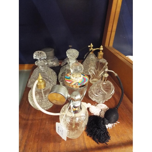 63 - A mixed selection of crystal and cut glass perfume and atomiser bottles (10)