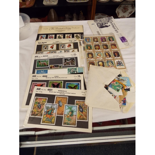 72 - A small quantity of stamps and first day covers to include Butterflies, Bhuta, The British Army etc