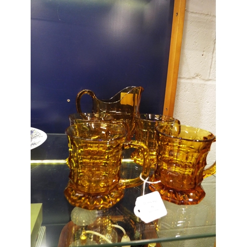 94 - A retro amber glass lemonade set