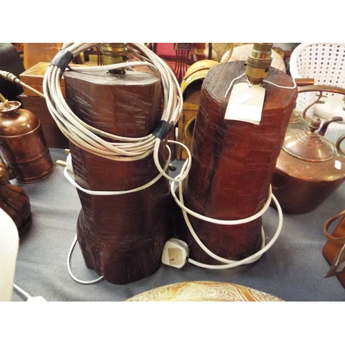 230 - A pair of heavy carved tree trunk lamps