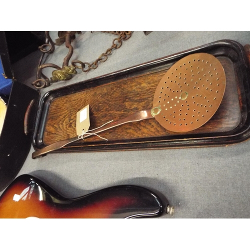 241 - A Victorian oak tray together with an early copper strainer