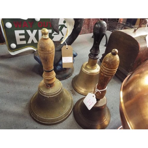 218 - Three brass bells with original clangers