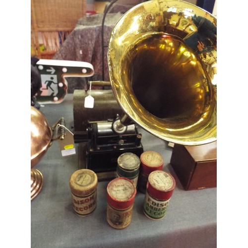 215 - A vintage Edison Gem phonograph with four cylinders and a brass horn, handle missing