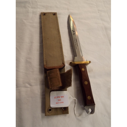 101 - A Gulf war 'Desert Storm Victory for Freedom' combat knife in canvas scabbard