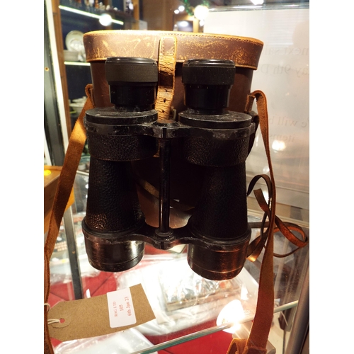 105 - A pair of Ross of London 10 x 50 binoculars in leather case