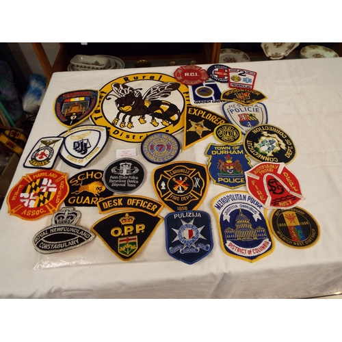118 - A selection of USA Police and Fire cloth insignia