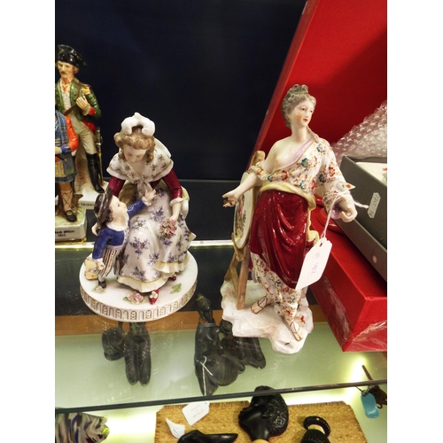 14 - Two German porcelain figurines for restoration