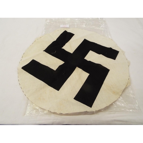 156 - An original German cloth Swastika from a cotton flag