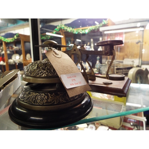 175 - A set of brass postal scales and weights together with a shop counter bell