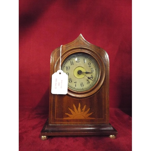 200 - A mahogany inlaid mantel clock the dial having Arabic numerals