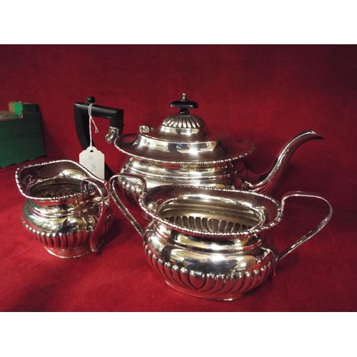 204 - A silver-plated three piece tea set