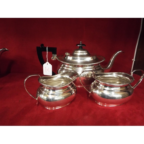205 - A Garrard & Co three piece silver-plated tea set