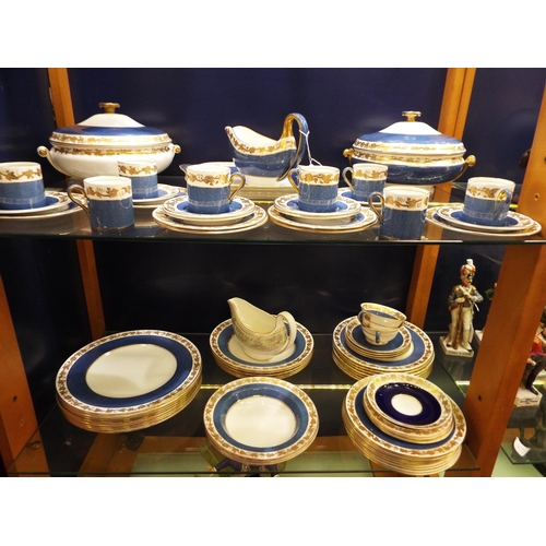 22 - A Wedgwood 'Blue Whitehall' pattern dinner service to include plates, bowls, tureens, coffee cups, s... 