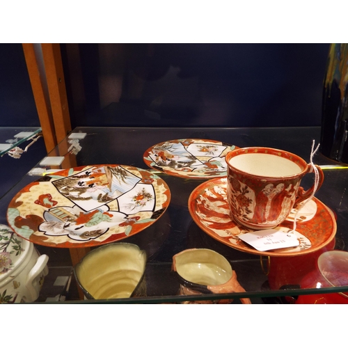 31 - Two pictorial Japanese small plates and a cup and saucer