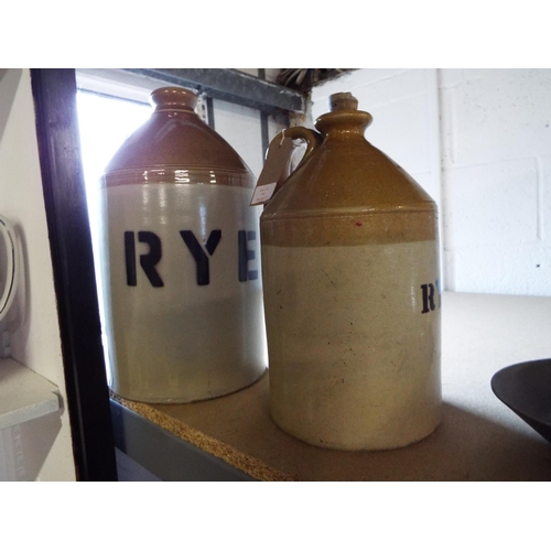 310 - Two vintage stone ware flagons with Rye mark