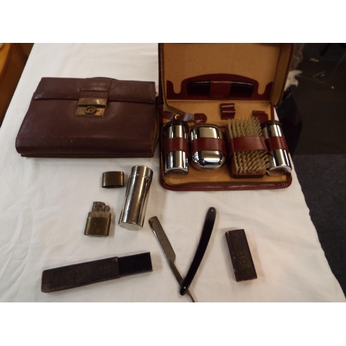 51 - A Gentleman's set in leather case, cut throat razor, lighter and leather stationery wallet