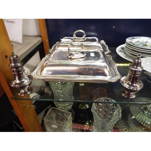 80 - A pair of Maple & Co silver-plated tureens and salt and pepper pot