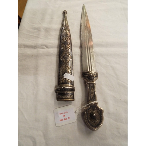 95 - A vintage silver Corsican Khanjali dagger having ornate decorated hilt and scabbard