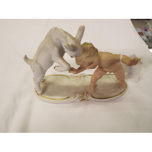 19 - A Wallendorf of Germany porcelain figure of child with goat