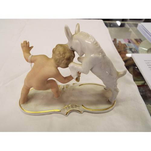 19 - A Wallendorf of Germany porcelain figure of child with goat