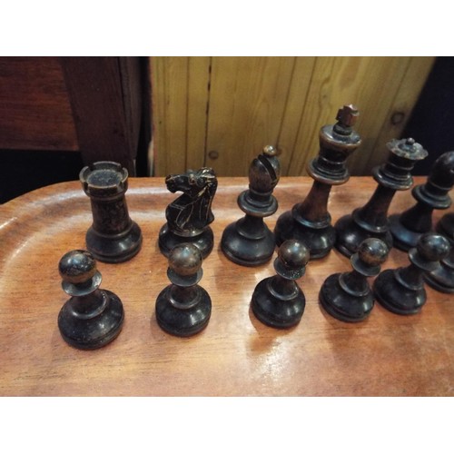 247 - A vintage carved wooden chess set (white Queen damaged)