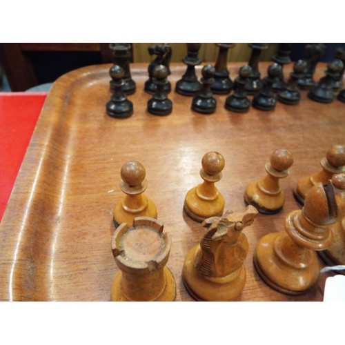 247 - A vintage carved wooden chess set (white Queen damaged)